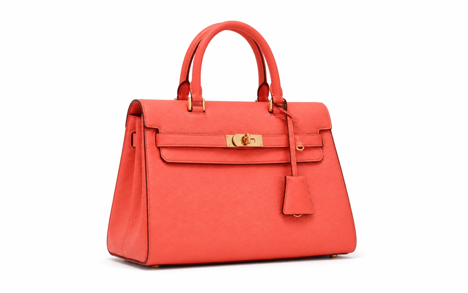 Coral handbag isolated on a clean white product background.