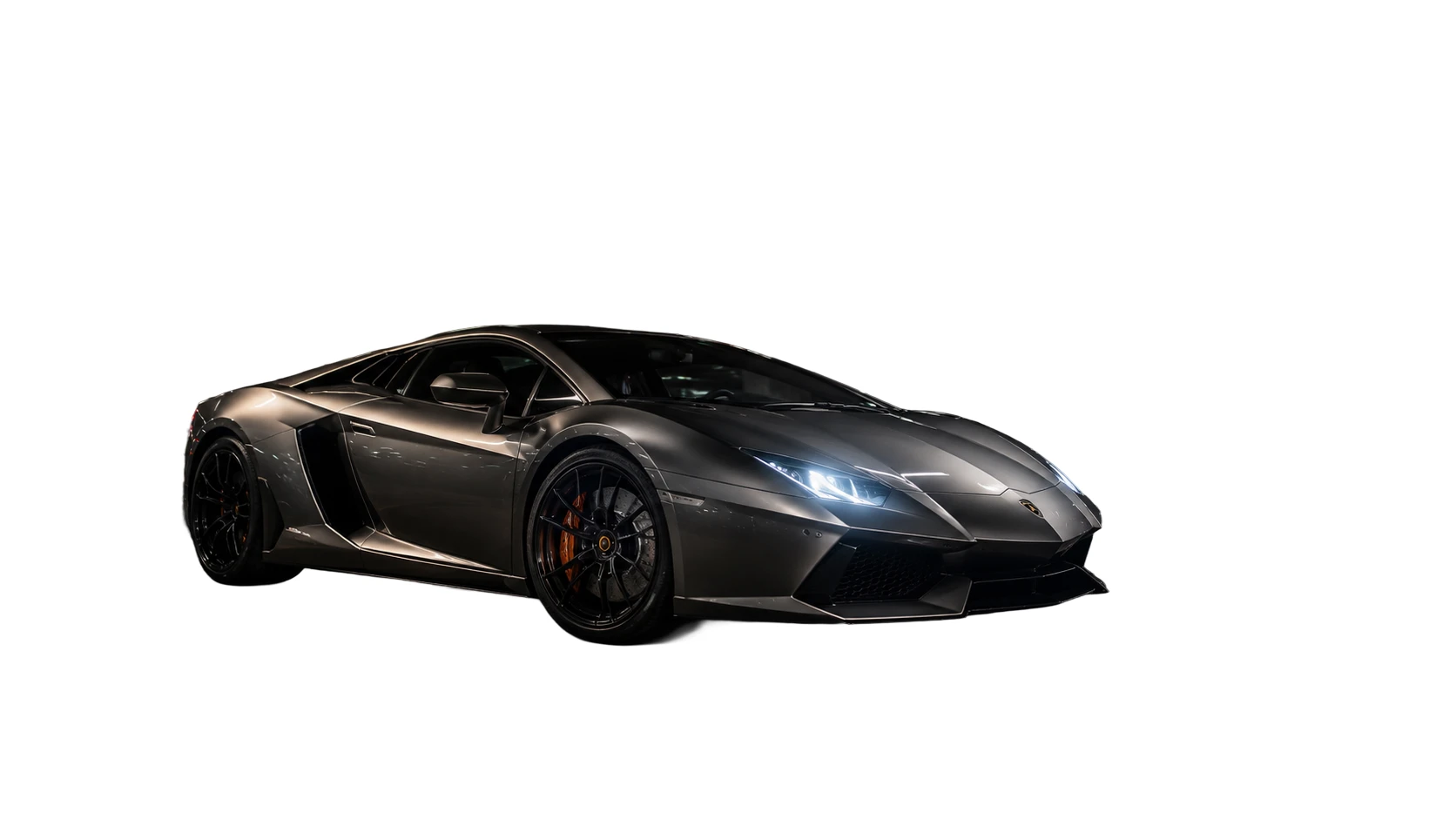 Dark sports car isolated on a clean white background.